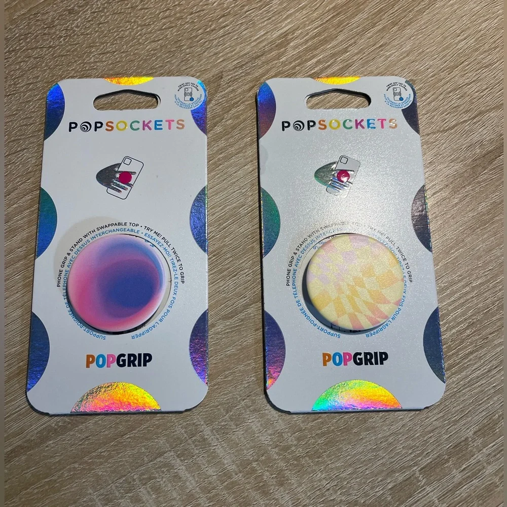 Two Popsockets: One Purple And Pink And One Yellow And Pink (E)
